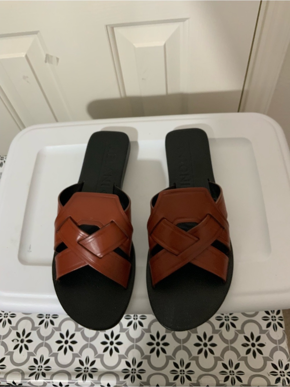 Antonio Melani Lynnley slide sandals in a brown woven leather